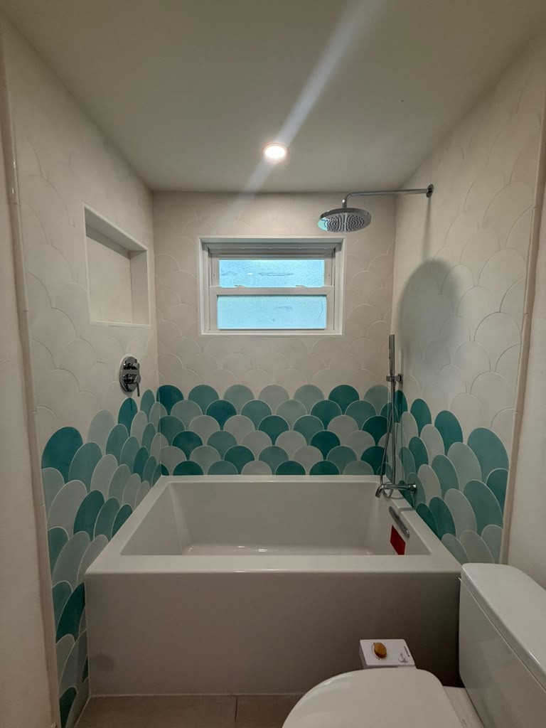 Japanese Soaking Tub with Fish-Scale Turquoise Tile