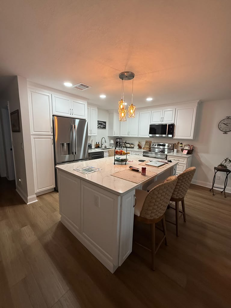 Precision Shaker Cabinetry and Quartz Countertop by Bolivia Craft